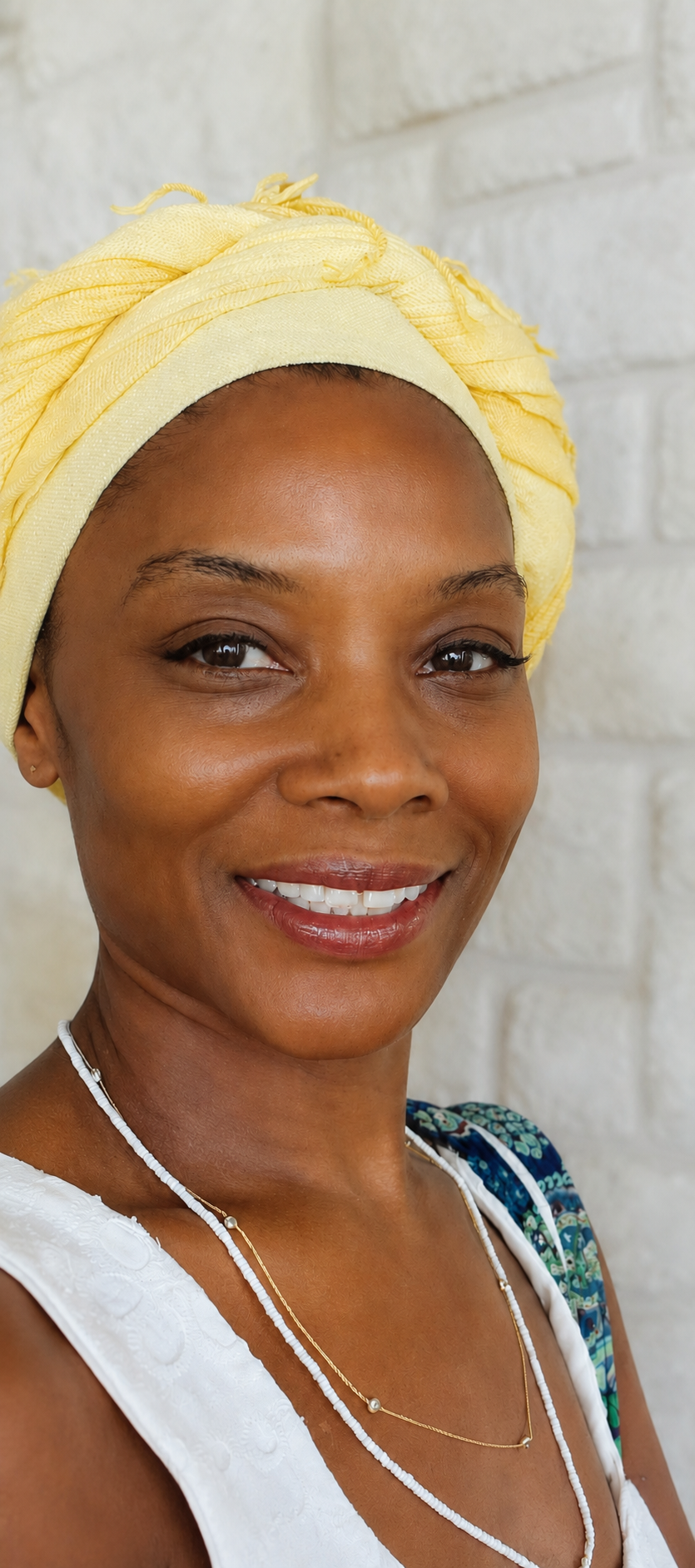 Portrait of Efúnṣewà Layssard, Wellness and Business Coordinator