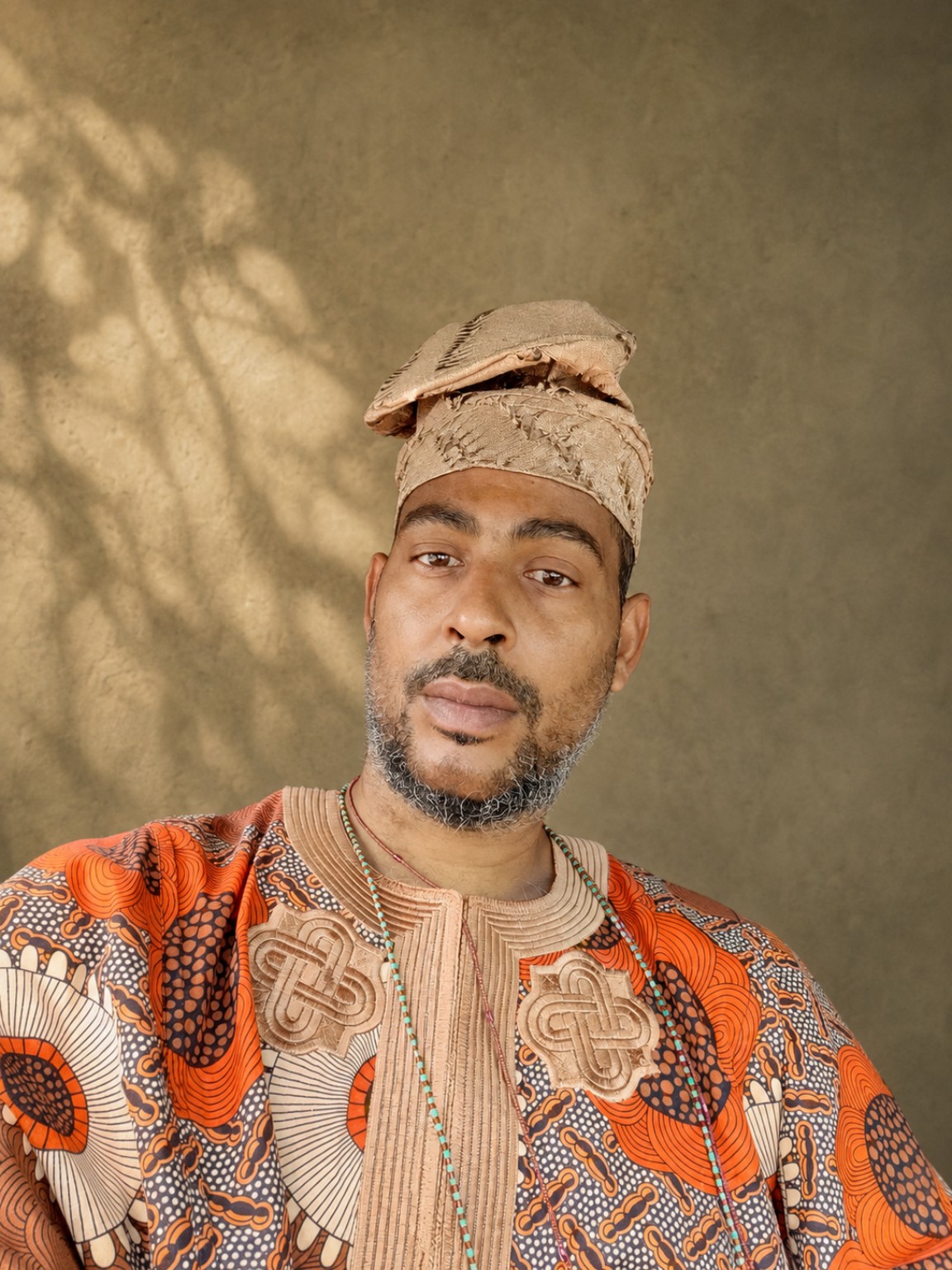 Portrait of Awo Èṣùdámílárẹ̀ in traditional Yoruba attire